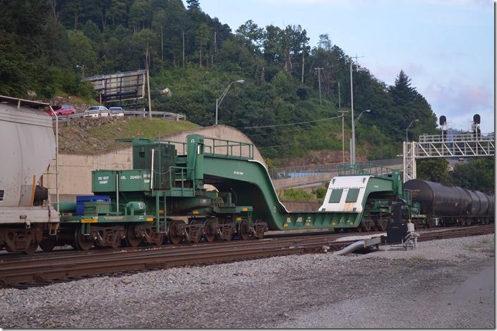 Kasgro Rail Corp. (KRL) 20-wheel depressed flat 204001 has a capacity of 899,500 lbs. It was built in 2008. From their website, KRL has acquired many of these cars from the major railroads. Williamson WV.