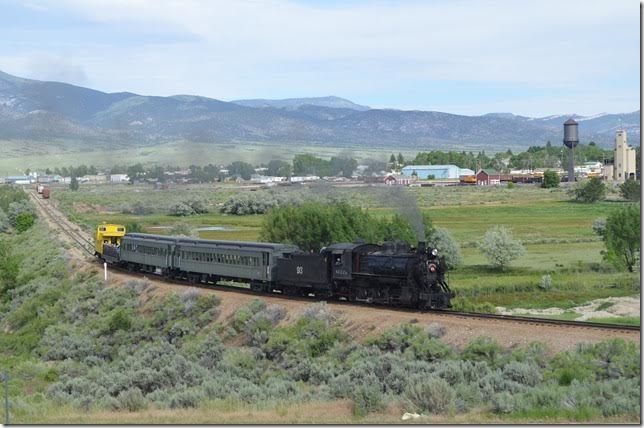 After backing from the station (right) to the junction (left), No 93 heads west out the ore line which skirts downtown Ely.