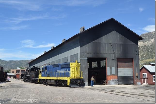 No. 40 is pushed west on the “ladder” track past the R.I.P. shop (Repair In Place). Formerly NN’s big fleet of ore hoppers, etc. were repaired here. A maintenance-of-way coach is undergoing restoration now.