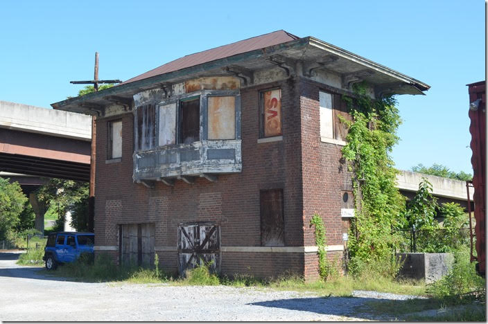 Abandoned N&W X Tower controlled their crossing with the old Southern main line and the west end of the station. The C&O is on back toward the river on the right. 08-24-2018. Lynchburg VA.