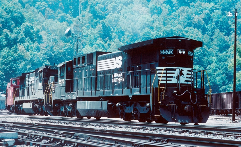 Another new GE model has arrived. C39-8s 8570-8591 (built 1985) have a whopping 3900 HP and run long end forward. 07-18-1987.