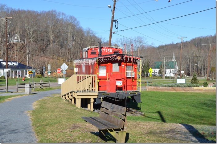 Former N&W caboose was built by the W&LE at their Ironville (Toledo) shop in 1949. It was donated to the city of Damascus in 1990. The church is in the background. N&W cab 557757. Damascus VA.