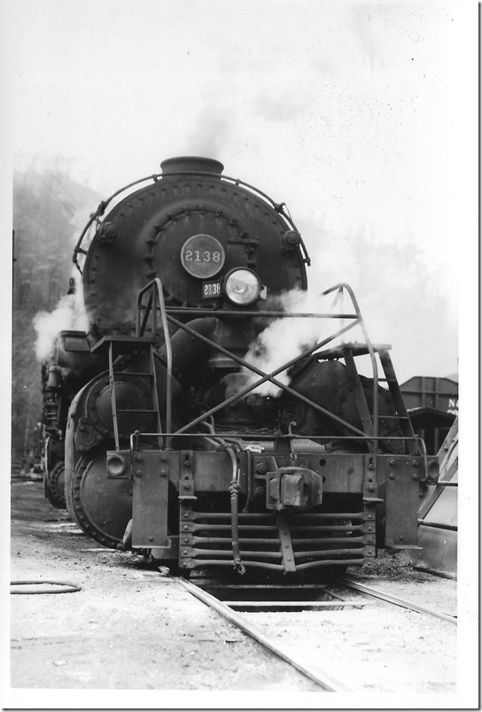 Bob realized that steam was on the way out when he visited Weller on 11-22-1959. 2138 is a Y-6 from the 1939 batch. In front of the pilot is the ash pit. No class other than Y-6 family were evident at Weller then. Many EMD GP-9s and ALCo RS-11s were on the property and more on the way. Stuart Saunders wanted steam gone. N&W 2138. Weller VA. 11-22-1959.