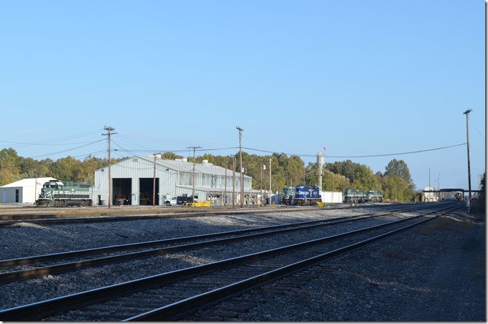 Paducah & Louisville’s diesel shop at Paducah. In the far background is the overhead bridge of the Paducah & Illinois Railroad, an IC and CB&Q subsidiary (now CN and BNSF). A butt-head switcher works the north yard, but I didn’t dare walk up there. PAL Paducah KY shop.