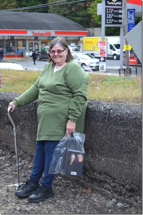 Sue has supported the local economy by buying some books. RBMN 425.