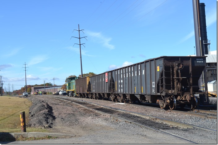 RBMN 1546 had been used on the “Jeddo Job” out to Stockton to pick up three loads of anthracite. A crew is working on the track in the background. W Hazleton PA.