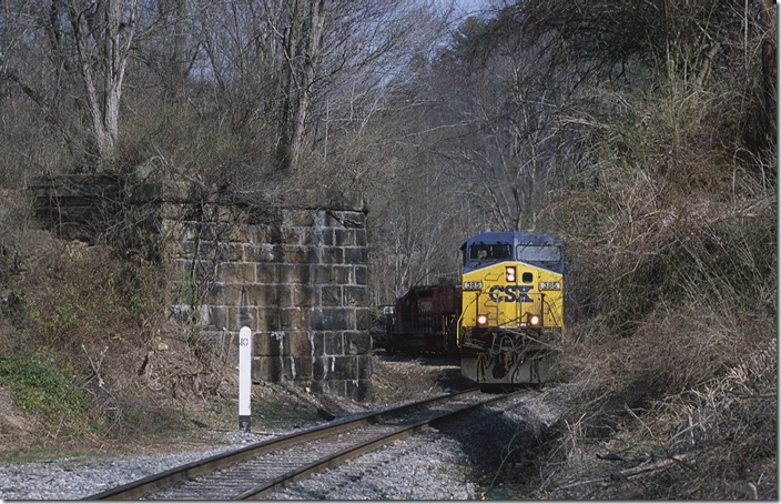 CSX 385-874-RJC 8718-8569 approach the abutments of the former C&O Price Hill Subdivision that went to the Mount Hope depot.