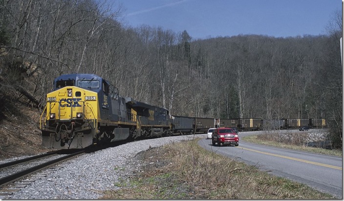 One employee engineers the train while the other follows with the truck. 