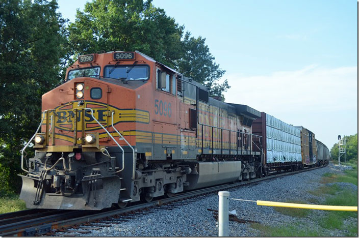 On my way home on Sunday, 08-29-2021, I paused at South Bluford to stretch my legs. Although the signals didn’t promise anything when I walked up the track, this south bound CN freight behind BNSF 5096 slipped up and startled me! Beware that the situation can change quickly! S Bluford IL.