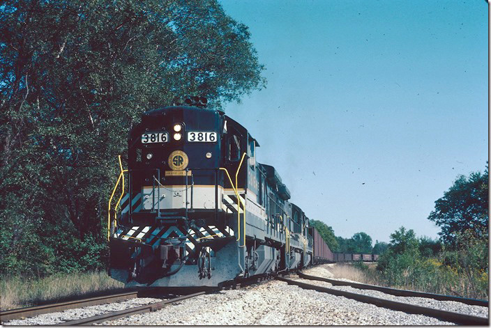 Southern B36-7s 3816-3818-3819 are flood loading at Old Ben Coal, Enosville IN, on the AW&W. AW&W was co-owned by Southern and Old Ben. 09-23-1981.
