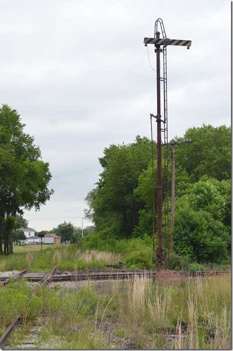 Looking east on the W&LE fka NKP Carrollton Br. It joins the former PRR and ends just out of sight. WLE crossing signal, Mnerva OH.