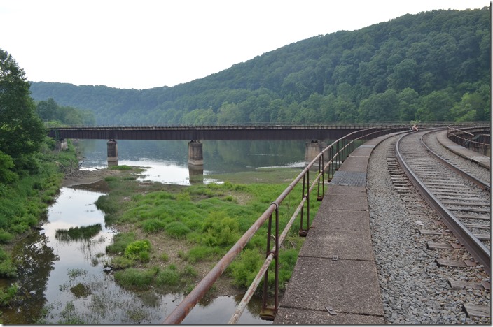 WNY&P operates the former Allegheny Branch short distance to serve an industry. Most of the rest of the line southwest toward Pittsburgh has been abandoned. Oil City PA. From WNY&P bridge.