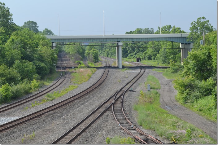 The mouth of Crab Creek. One of these is the NS, ex-CR, nee-NYC Youngstown Line line up to Ashtabula. This is looking east toward Struthers and the infamous Center St. crossing. Former E-L may be in there on left. Maybe NS’s Lordstown Secondary (ex-PRR) going off to the right beyond bridge. Probably near “Creek” on Youngstown Line and “Crab” on the Lordstown. NS Youngstown Crab Creek OH.