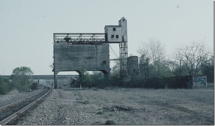 Former Pennsy main line coal dock at Girard, OH looking east toward Youngstown. There was once an extensive yard in this area. We were driving east on I-80 (in background) 05-02-2001, and I spotted this coal dock. Google Maps shows it still there.