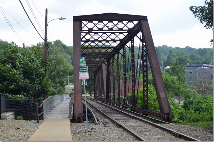 WNY&P Oil Creek bridge built by the Atlantic & Great Western (Erie predecessor) ca. 1892. Looking east toward downtown. Eastward. Oil City PA. 06-21-2021.