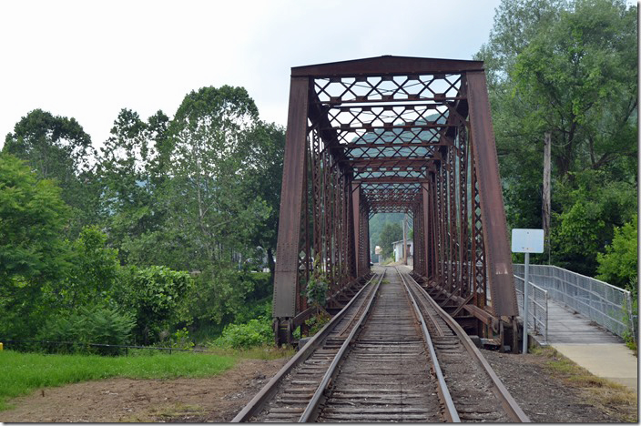 WNY&P Oil Creek bridge looking toward Franklin. A WNY&P track man was parked on the other side of the bridge. He said WNY&P comes in a couple of times a week. They serve the Sasol refinery (former Pennzoil or Quaker State) refinery north of town on PA 8. WNY&P also serves an industry down the old P-C, nee-PRR truncated Allegheny Branch from Bridge Jct. Oil City PA. Westward.