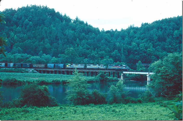 L&N GP38 4037 leads two more ‘38s southbound at Reliance on the early evening of 06-17-1982. L&N bridge. Reliance TN.