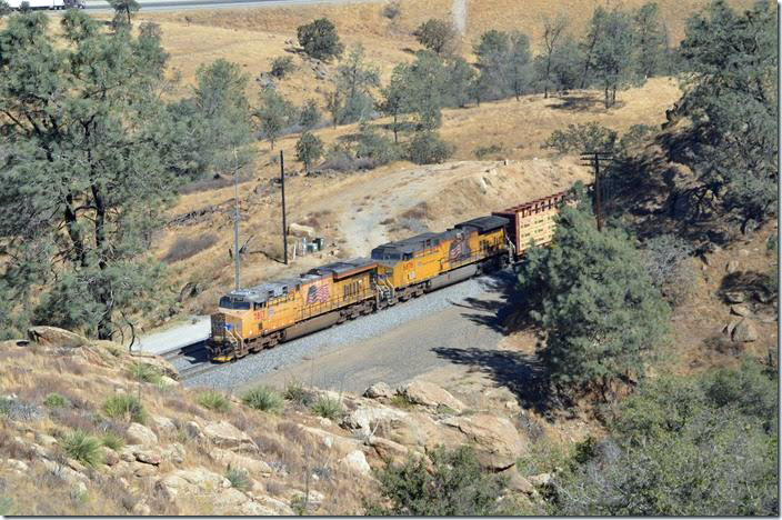 After BNSF 5489 passes the eastbound UP freight starts moving onto single track with 7817-6678 assisting. Near Tunnel 10.