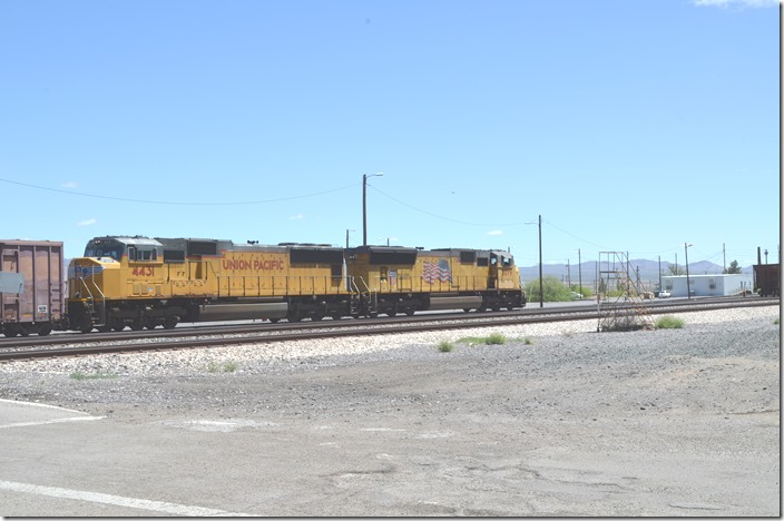 UP doesn’t worry about blocking this crossing, as there is an underpass nearby. That’s the yard office on the right. UP 4431-5079. View 3. Lordsburg NM.