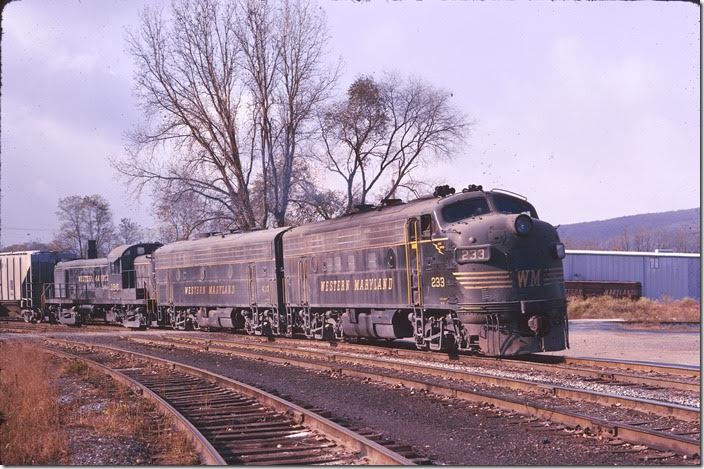 Nos. 233-410-196 arrive Maryland Jct. on the main line with a westbound freight. WM Ridgeley WV. 