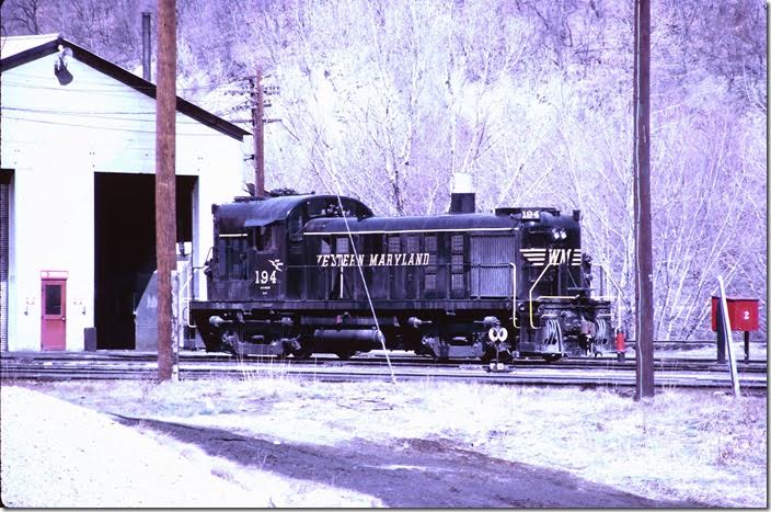 RS-3 194 had been equipped with a steam generator in the short end. Although they had a large roundhouse here for steam, this small shop sufficed for diesels. WM Ridgeley WV.