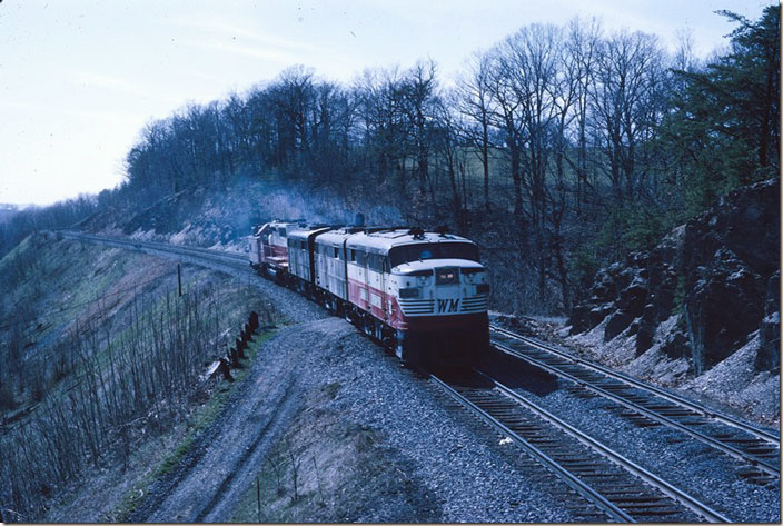 The helper has crossed to the eastbound track and grabbed the caboose. WM Williamsport MD.