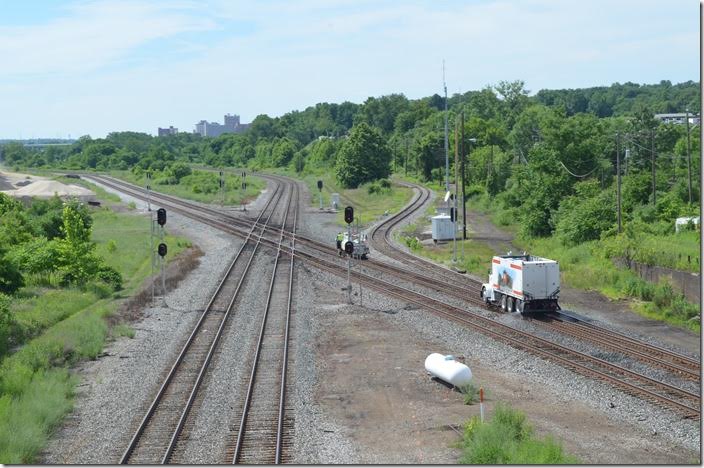 In the day there were 11 tracks in this view from the Center Street bridge between Campbell and Struthers. That’s downtown Youngstown in the distance looking west in late afternoon. NS owns the former PRR E&A main line. The single track is a former NYC connector to the P&LE, but I’m not sure of its function now except to connect with Genesee & Wyoming’s subsidiary lines in the area. The B&OHS covered that lines Youngstown operations very well in the Fourth Quarter 2015 issue of The Sentinel. CSX weed sprayer. Haselton OH. View 2.